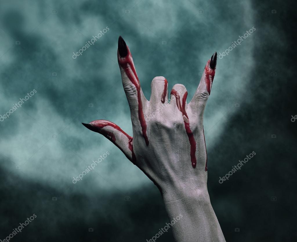 Señal de mano de roca Halloween — Foto de stock #54076415 © Remains, image size:1024x835