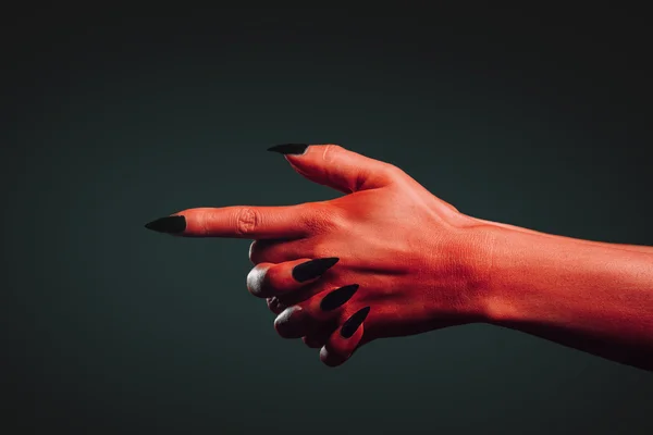 Demon hand with gesture shoot — Stock Photo, Image