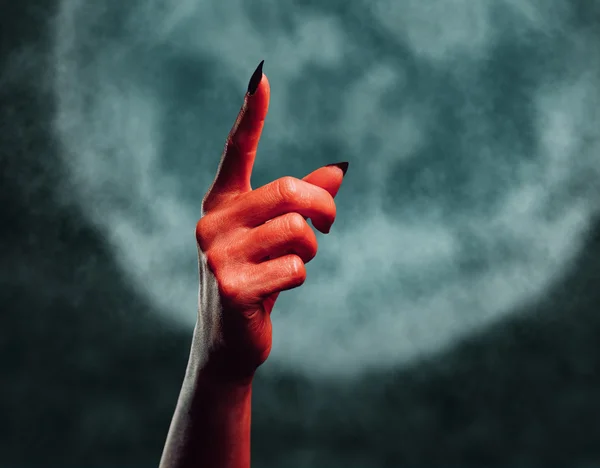 Demon hand wijzen naar boven — Stockfoto