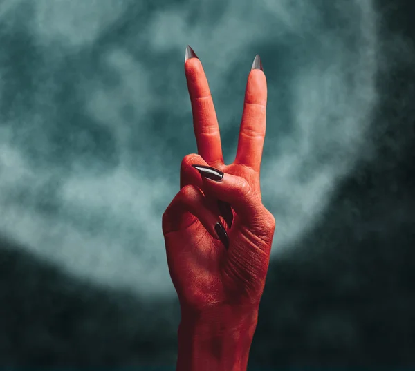 Mano del diablo con señal de mano de paz — Foto de Stock