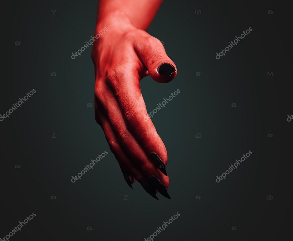 Mano demoníaca con gesto de apretón de manos — Foto de stock #54339965 ©  Remains, image size:1023x840