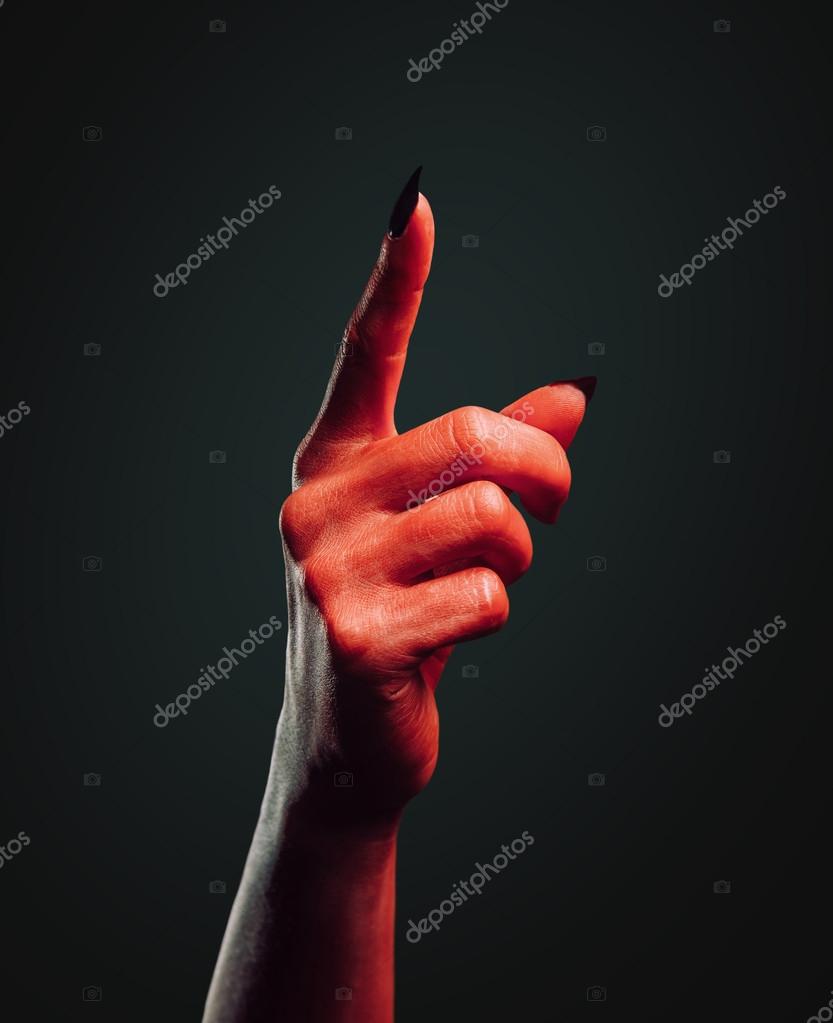 悪魔の手上向きのジェスチャーで ストック写真 C Remains 悪魔の手上向きのジェスチャーで ストック写真 C Remains