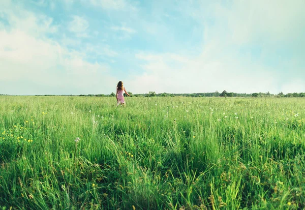 Girl on summer meadow — Stock Photo, Image