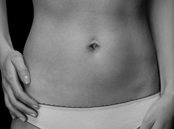 Barriga feminina adulta — Fotografia de Stock