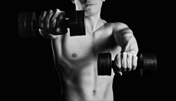 Muscular man with dumbbells — Stock Photo, Image