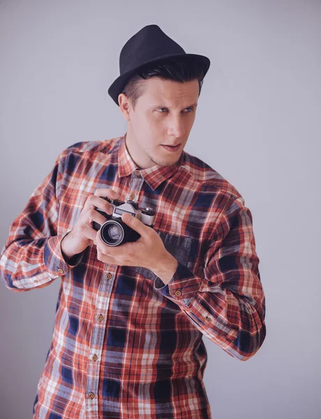 Hipster man with old photo camera — Stock Photo, Image