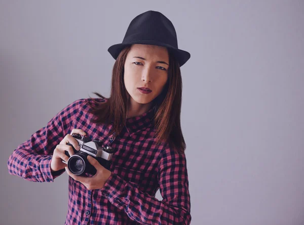 Hipster girl with old photo camera — Stock Photo, Image