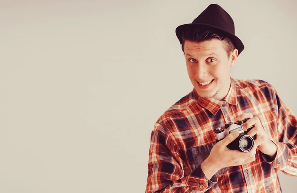 Man holding old photo camera — Stock Photo, Image