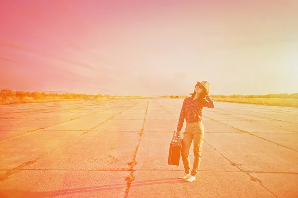 Hipster woman with suitcase — Stock Photo, Image