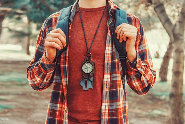 Tourist man with compass — Stock Photo, Image
