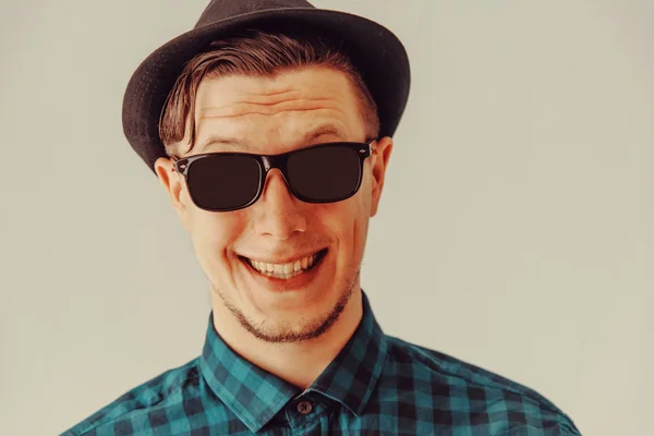 Happy young man in hat — Stock Photo, Image