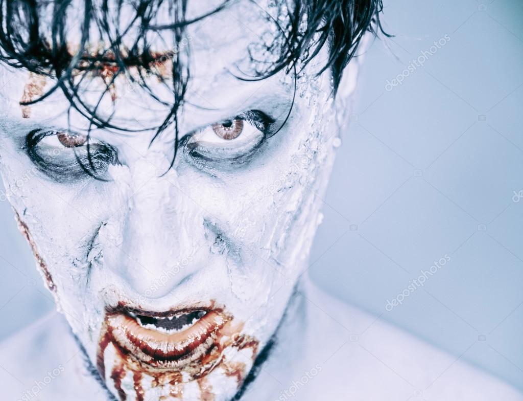 scary zombie man in blood
