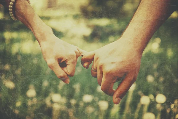 Couple in love holding hands — Stock Photo, Image