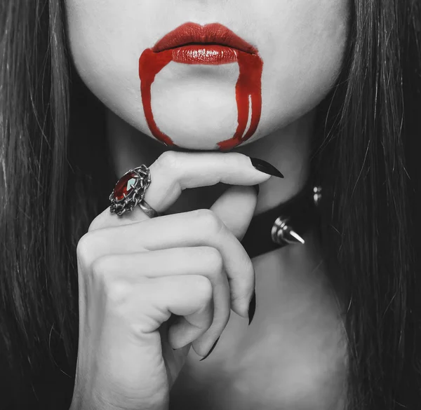 Vampire woman with red lips in blood — Stock Photo, Image