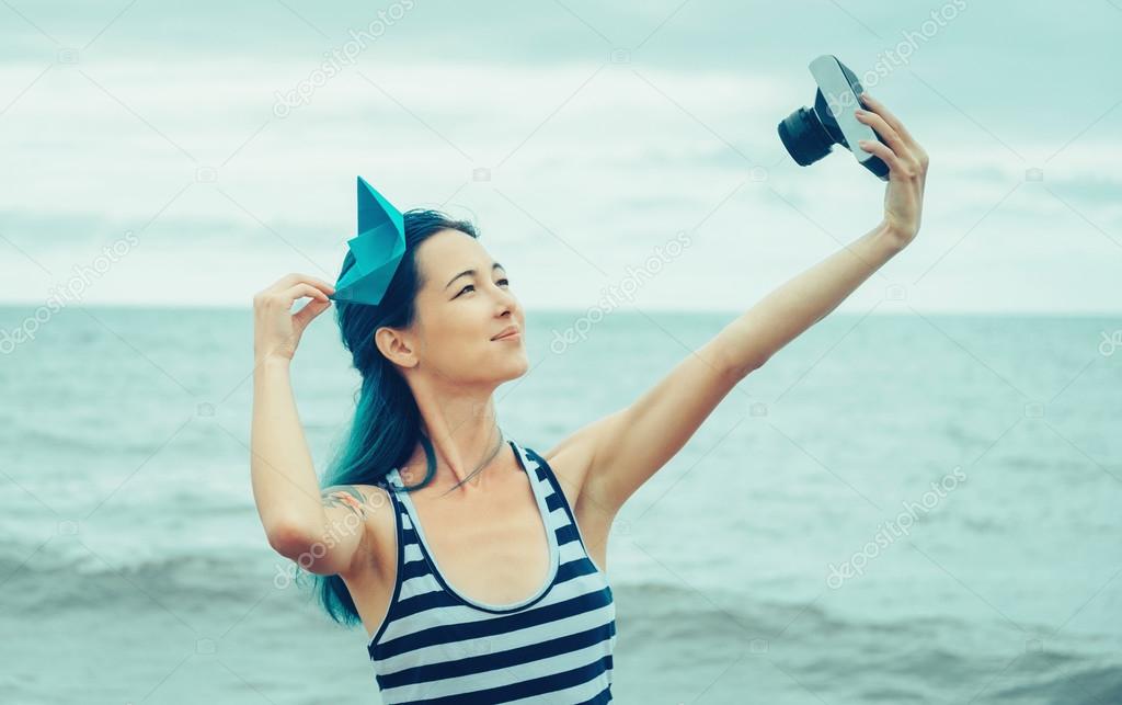 Sailor girl doing self-portrait