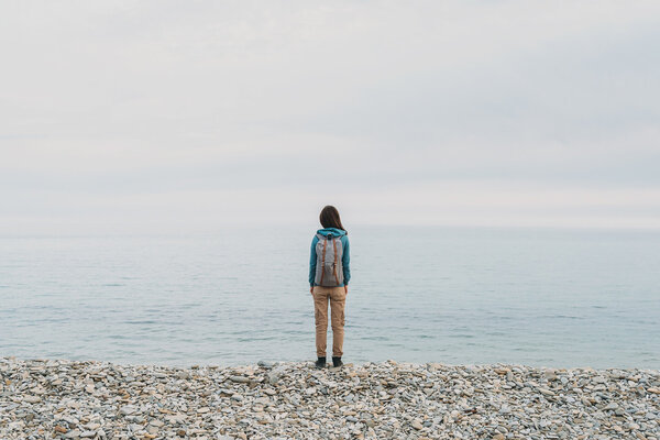 Girl enjoying view of sea 