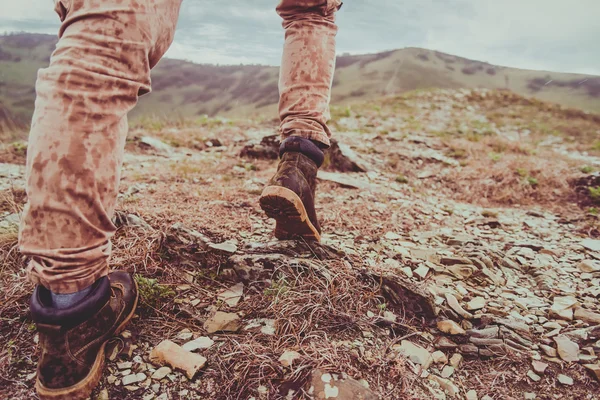 Hiker walking up on mountain — Stock Photo, Image