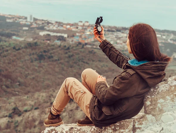 Searching direction with a compass — Stock Photo, Image