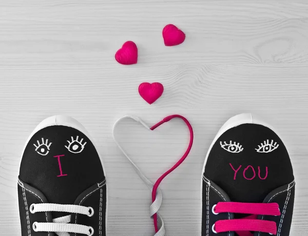 Valentine's Sneakers with laces and eyes. — Stock Photo, Image