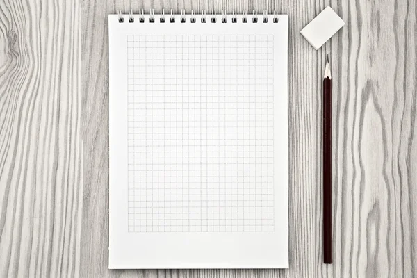 Notebook with a pencil on a table — Stock Photo, Image