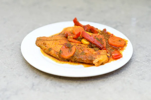 Chraime is traditional Moroccan, Jewish, Arabian dish. Chraime shabbat fish in tomato sauce, garlic, pepper, spices. — Stock Photo, Image