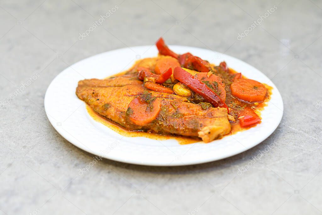 Chraime is traditional Moroccan, Jewish, Arabian dish. Chraime shabbat fish in tomato sauce, garlic, pepper, spices.