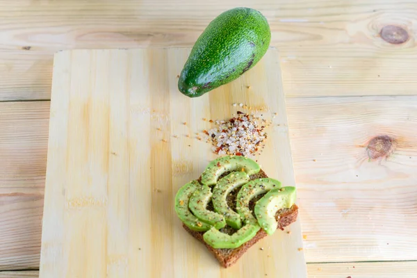 Spicy avocado toast - healthy breakfast. Top view.