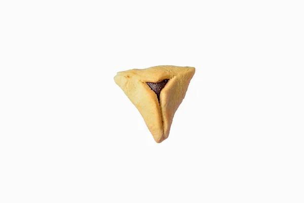 Een Hamentashen, Ozen Haman, Purim koekje op witte achtergrond voor Joodse vakantie Purim. — Stockfoto