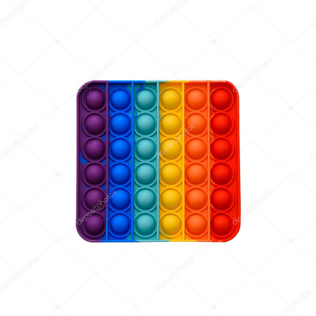 Poppit-new fidget toy, popular with kids, helps them to concentrate. Rainbow Pop it fidget toy isolated on white.