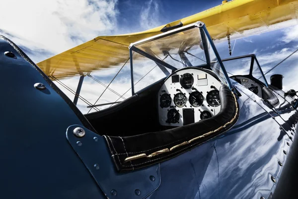 This nostalgic photo treatment of this bi-wing aircraft cockpit adds a historical treatment to aviation in the early 1900's — Zdjęcie stockowe