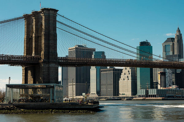 New York, New York, United States - April 14, 2011: Carousel park and brooklyn bridge in Dumbo New York.
