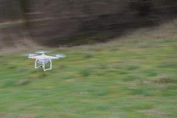 Flying drone in fast motion — Stock Photo, Image