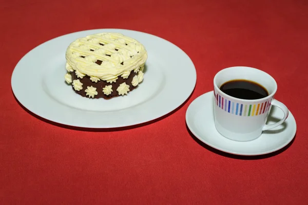 Xícara de café com sobremesa cremosa — Fotografia de Stock