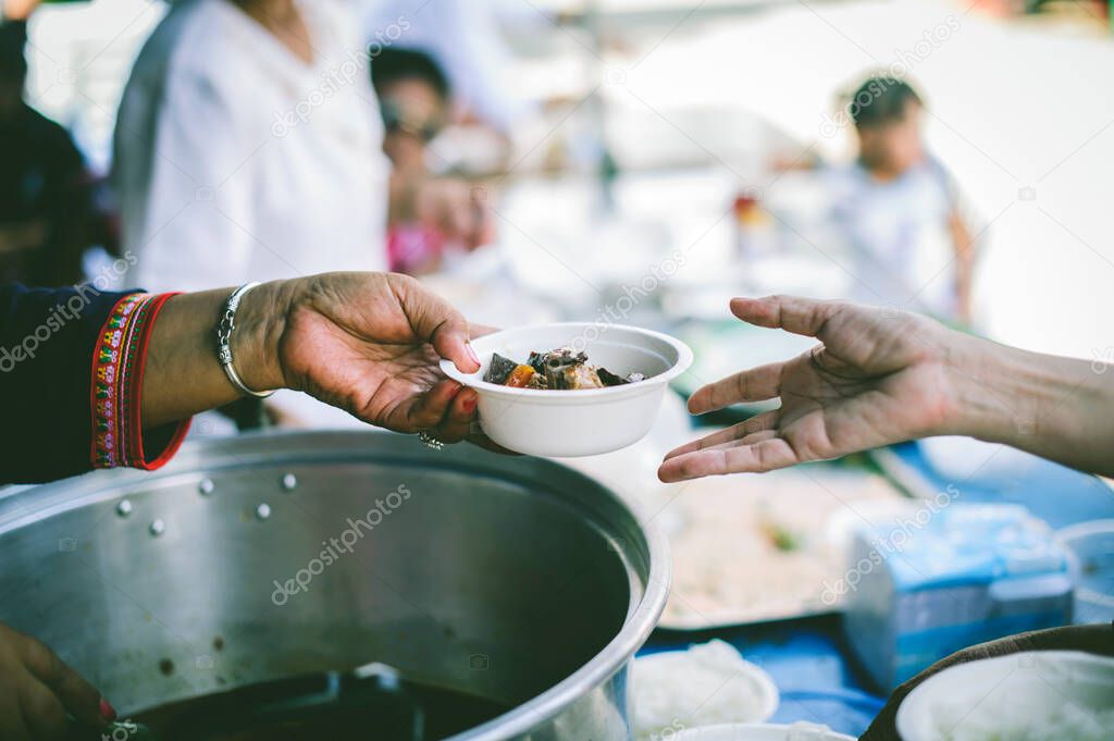 Free food for poor and homeless people: concept of sharing