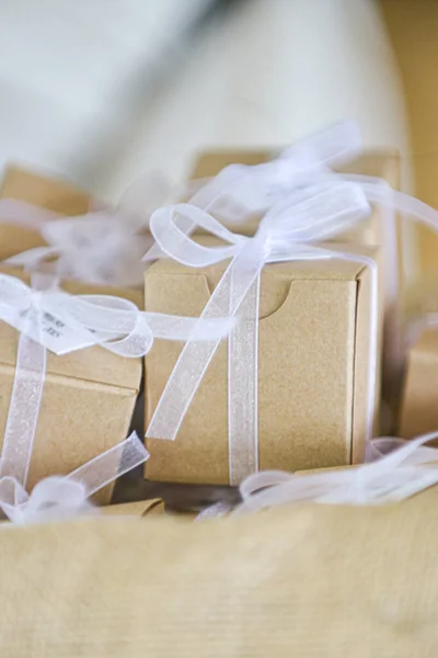 Miniature Brown Cardboard Gift Boxes Wrapped White Bows Laces Canvass — Zdjęcie stockowe