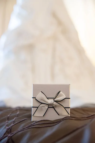 White brides jewelry box with white bow and lace