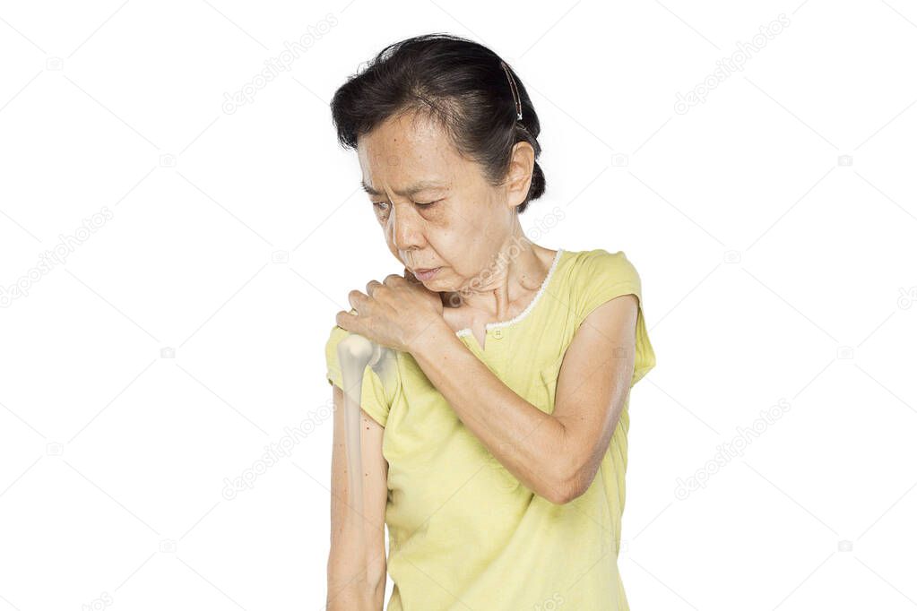 old asian woman feel shoulder muscle injury	