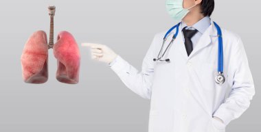 Doktor Point akciğer zatürresi virüsü gri arka planda COVID-19 enfeksiyonu var.