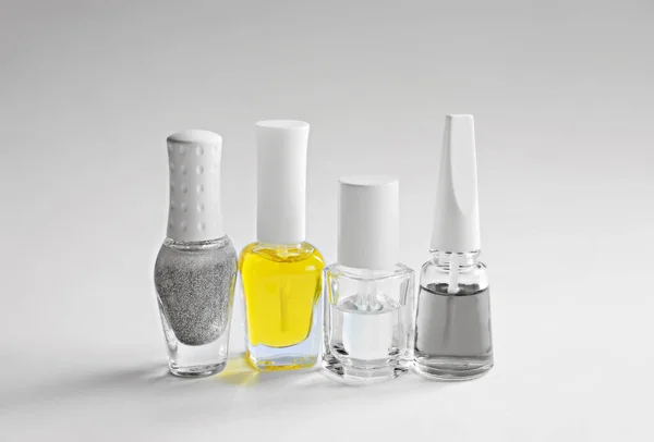 Set Nail Care Products Bottles Gray Clear Yellow Manicure Varnish — Stock Photo, Image