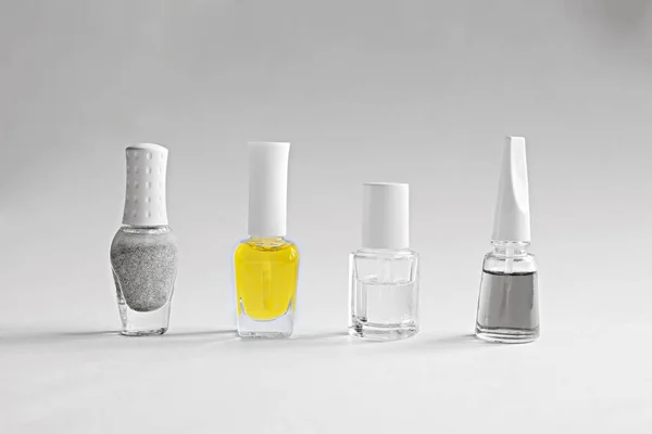 Set Nail Care Products Bottles Gray Clear Yellow Manicure Varnish — Stock Photo, Image