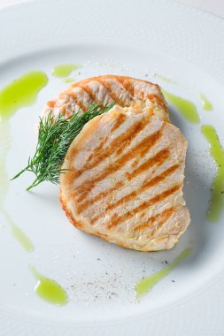 Menu for the restaurant: loin with spicy sauce.