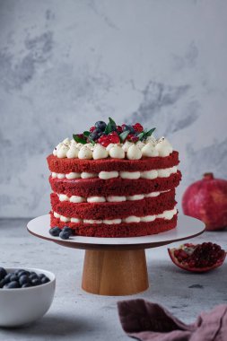 Sponge cake red velvet. Cake with cream cheese cream and raspberry filling.