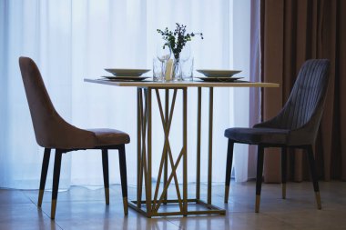 Table setting in the restaurant. Preparing the restaurant for receiving guests.