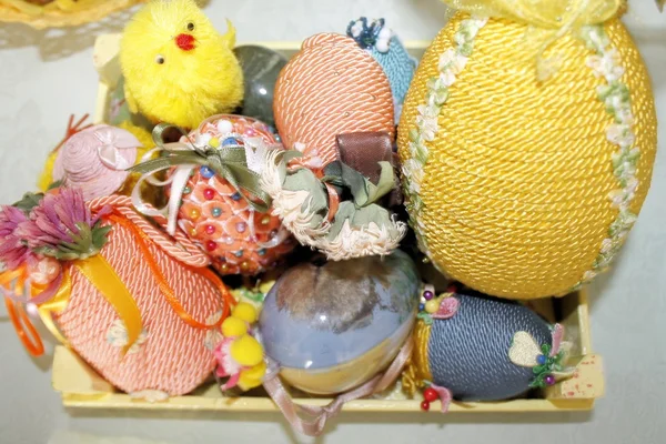 Easter basket with colored eggs and chick — Stock Photo, Image