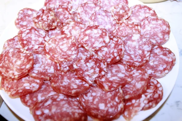 Background slices of salami — Stock Photo, Image