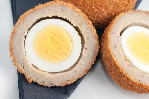 Scotch eggs cut in half — Stock Photo, Image