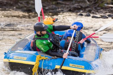 Llangollen Wales UK - January 28 2017: White water rafting a popular team building or group activity on the river Dee or Afon Dyfrdwy  clipart