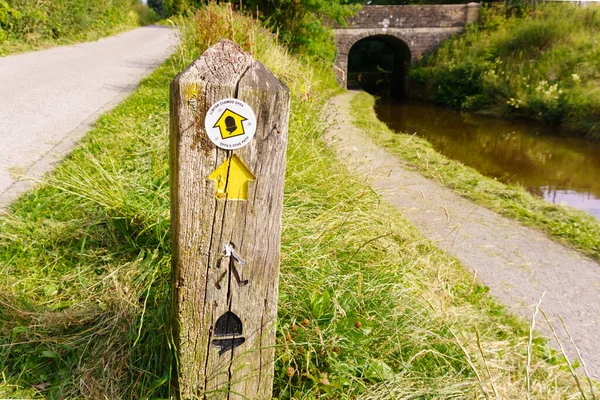 Offa's Dyke public footpath sign in English and Welsh languages a 177 mile long walking trail in the UK