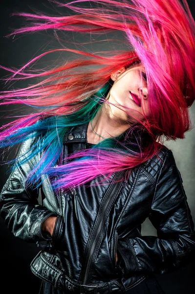 Young girl movement colour hair magnificent Stock Image