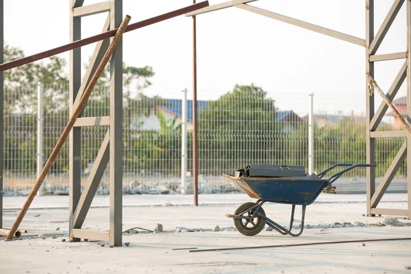 Steel pile on construction trolley in construction site